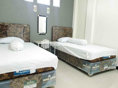Hotel Boarding House Syariah Mm Bone Redpartner