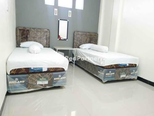 Hotel Boarding House Syariah Mm Bone Redpartner