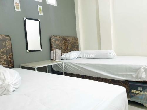 Hotel Boarding House Syariah Mm Bone Redpartner