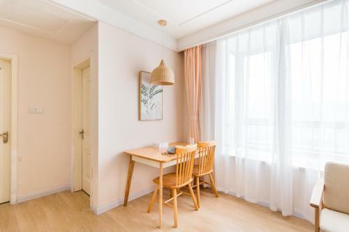Hotel Qingdao Shinan�wusi Square�