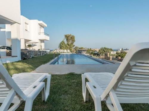 Attractive Holiday Home In Gennadi With Shared Swimming Pool