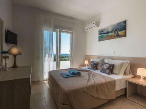 Ravishing Holiday Home In Gennadi With Shared Swimming Pool