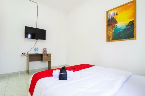 Hostal Reddoorz Near Universitas Pamulang