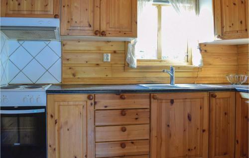 Two-bedroom Holiday Home In Olensvag