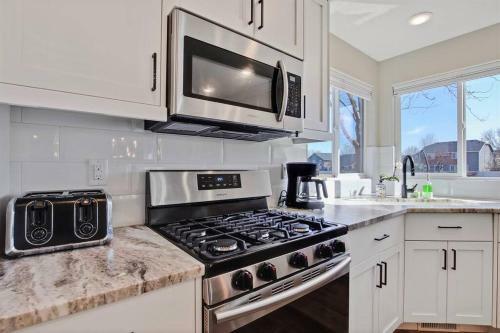 The White Custom Farmhouse 5 Bedroom Home