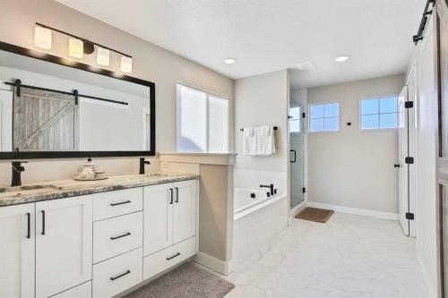The White Custom Farmhouse 5 Bedroom Home