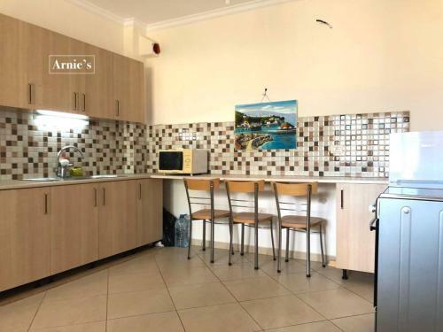 Apartamento Arnie's Sunny Seaside Residence