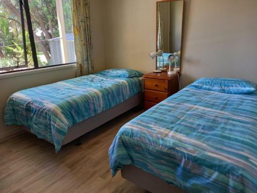Palm Retreat - Matarangi Holiday Home
