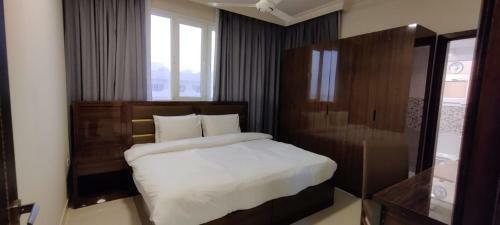 Apartamento Al Noor Suites