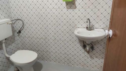 Hotel Pop 91925 Lekshmi Rooms & Villas