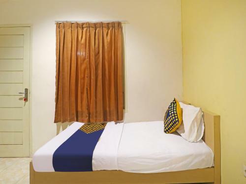 Hotel Spot On 91504 De Vila Ungu Syariah