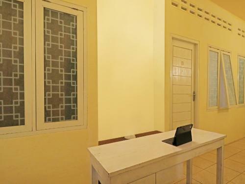 Hotel Spot On 91504 De Vila Ungu Syariah