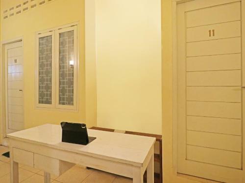 Hotel Spot On 91504 De Vila Ungu Syariah