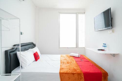 Hotel Reddoorz @ Aralia Harapan Indah
