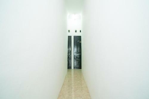 Hotel Reddoorz @ Aralia Harapan Indah