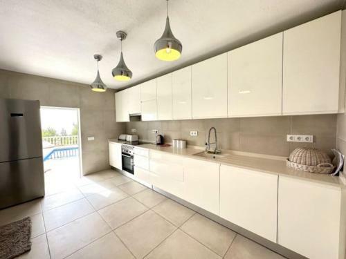 Luxury Four Bedroom Moraira Villa With Heated Pool