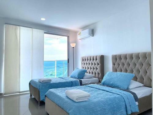 Apartamento Lovely 2-br Oceanfront Condo With Rooftop Pool