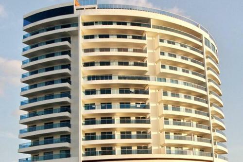Apartamento Lovely 2-br Oceanfront Condo With Rooftop Pool