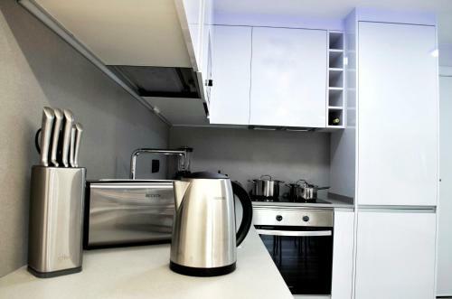Apartamento Modern Oasis - Pool, Gym & Tennis