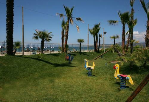 Viviendas Turisticas Villaggio Le Palme