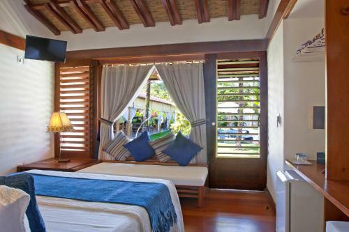 Hostal Pousada Villa Palmeira Azul Su�tes de Charme
