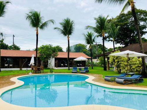 Hostal Pousada Villa Palmeira Azul Su�tes de Charme