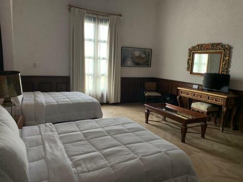 Apartamentos Hotel Posada La Ermita
