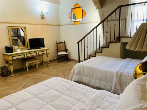 Apartamentos Hotel Posada La Ermita