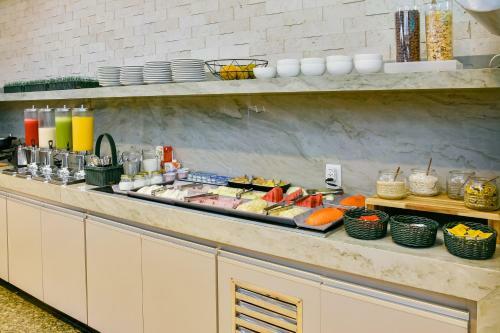 Hotel Plaza Inn Breeze Aeroporto