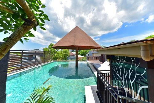 Hotel Denbukit Residence And Suite