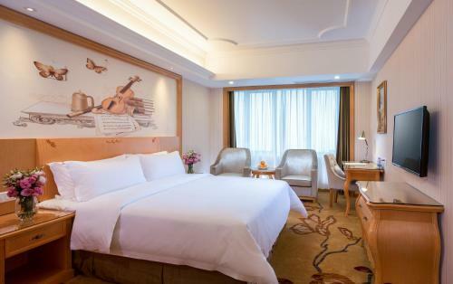 Vienna Hotel Songjiang Xin Qiao