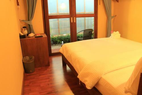 Hostal The Noi Guest House & Restaurant