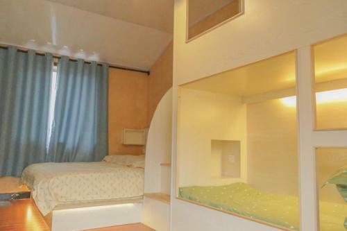 Xidi Kunlun International Hostel