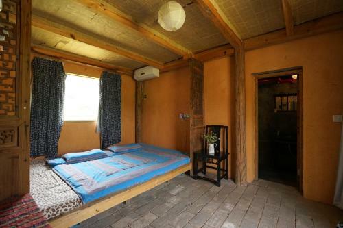 Xidi Kunlun International Hostel