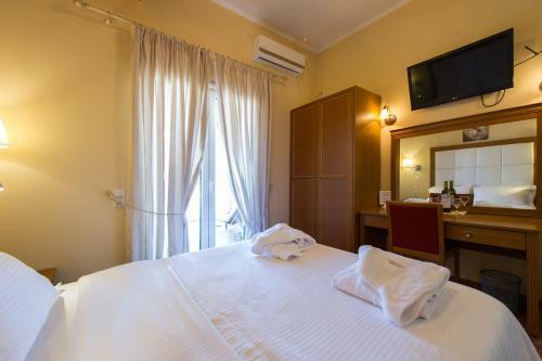 Apartamento Petros Penthouse & Studios