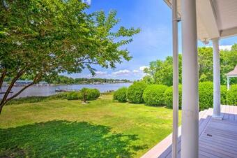 Elegant Waterfront Home With Bar, Deck And Views!